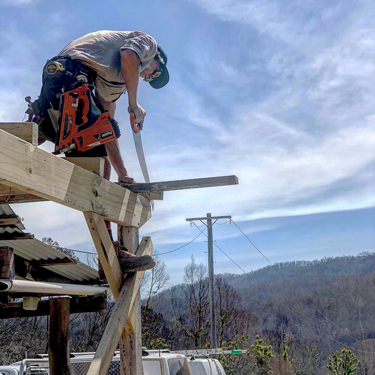 photo of Julian's doing carpentry work